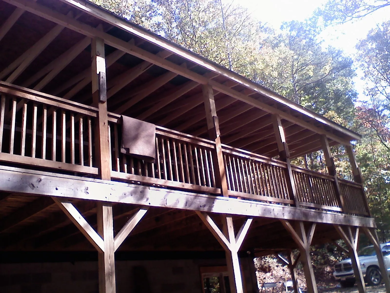 Timber framing under a new elevated porch and deck — Roof Leak Repair in Davis Junction by Roofing Brothers